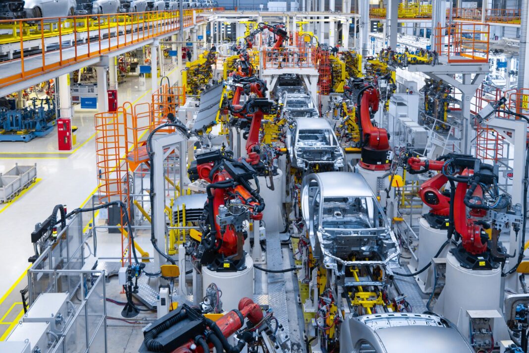 assembly-line-production-new-car-automated-welding-car-body-production-line-robotic-arm-car-production-line-is-working (1)